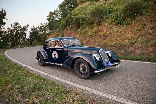 Classic sports car Alfa Romeo 6C 2300 B Mille Miglia (1937) in Gran Premio Nuvolari 2018 Vintage Italian sports car Alfa Romeo 6C 2300 B Mille Miglia (1937) in classic car race Gran Premio Nuvolari on September 14, 2018 in Modigliana, FC, Italy premio stock pictures, royalty-free photos & images