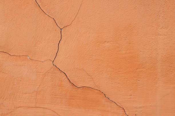 istock Background of old yellow painted wall 1127597363