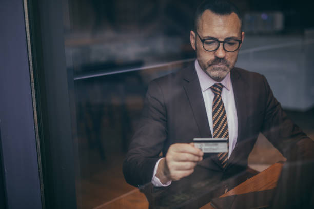 istock Senior businessman making online reservation 1127597582