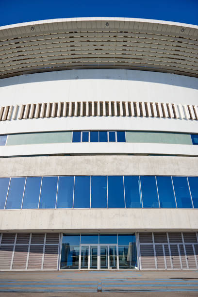 istock Modern Building with Glass Facade over Blue Sky 1127597896