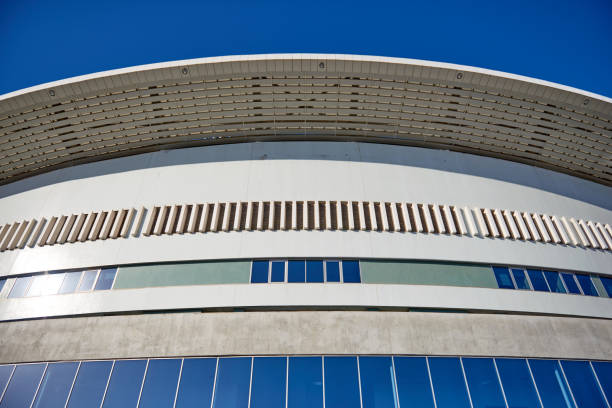 istock Modern Building with Glass Facade over Blue Sky 1127597934