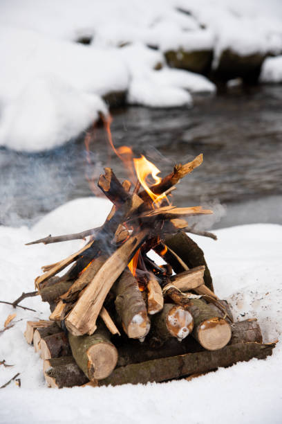 Bonfire by the lake at sunset
