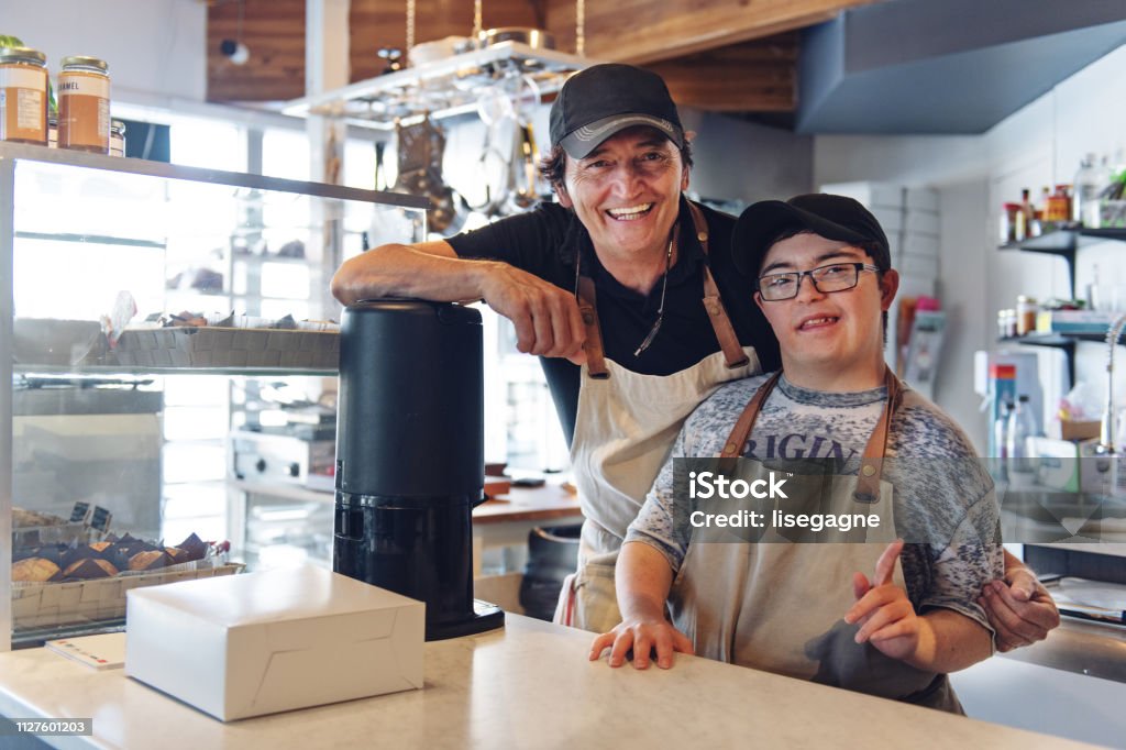 Small business family created for disable people Small business family created to include people with disabilities in order to have equal opportunity as everyone else Disability Stock Photo