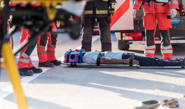 istock Rescue Team Helping Victim Of Car Crash 1127601254