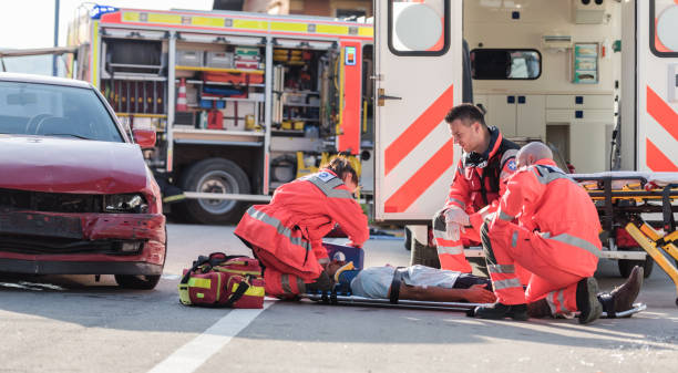 istock Rescue Team Helping Victim Of Car Crash 1127601266