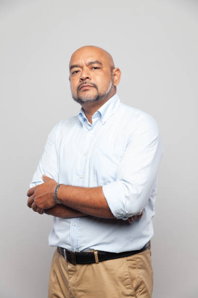 istock Indian male portrait confident bossy proud look expression folding arms 1127601333