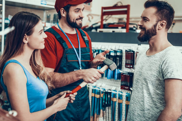 istock Salesmen is Showing New Rubber Hammer to Clients 1127602102