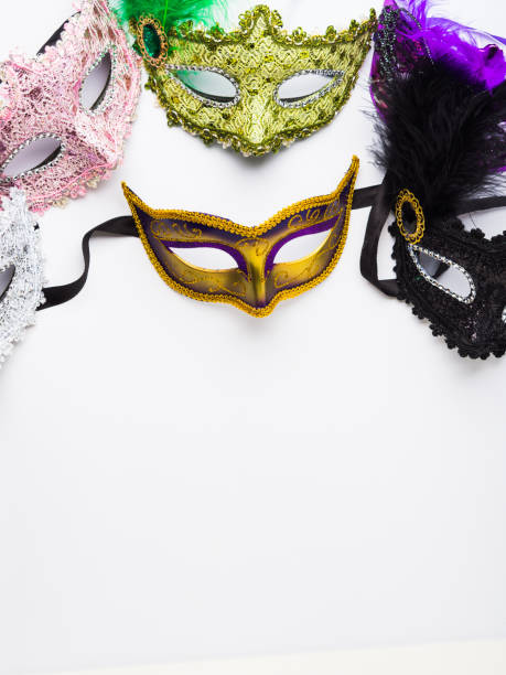istock Colorful carnival masks on white background 1127605262