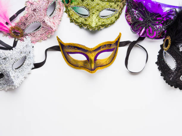 istock Colorful carnival masks on white background 1127605266