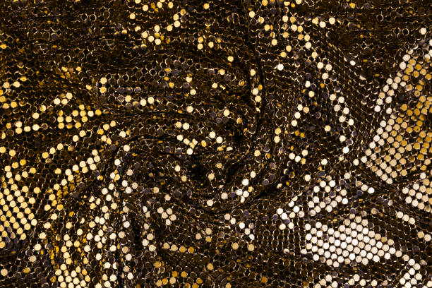 istock Abstract background with gold sequins color on the fabric. 1127607235