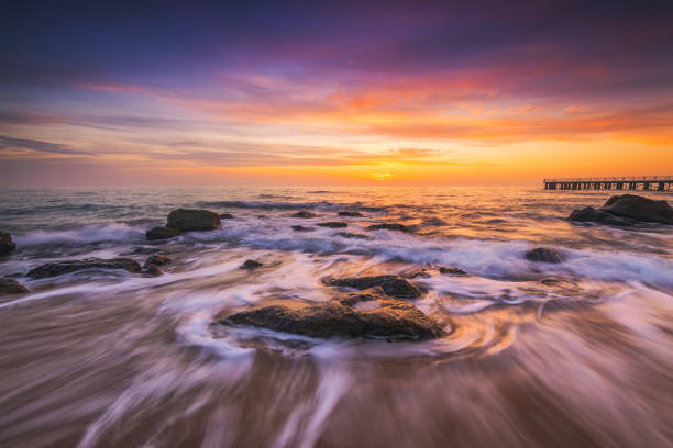 istock Beautiful cloudscape over the sea, sunrise on the beach 1127609531