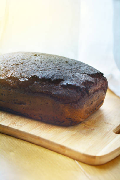 istock A loaf of rye bread on a wooden table 1127610518
