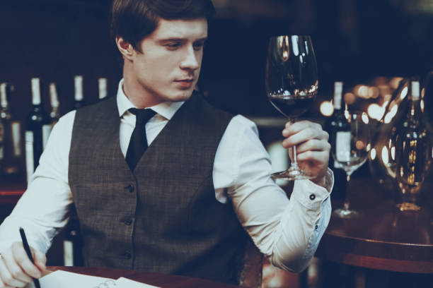 istock Sommelier is Tasting Wine in Restaurant 1127610995