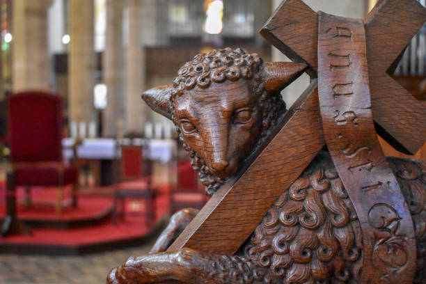 A wood carving of a Lamb and Cross in St Martin's Cathedral in Bratislava, Slovakia
