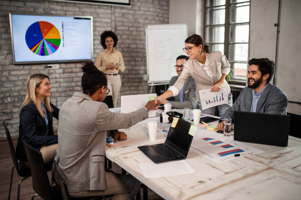 istock Multi-tasking business people working on a meeting in the office 1127612483