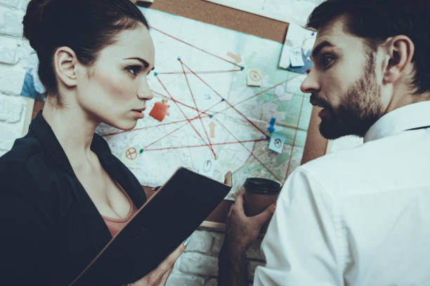 istock Detectives is Working in Private Detective Agency 1127614631