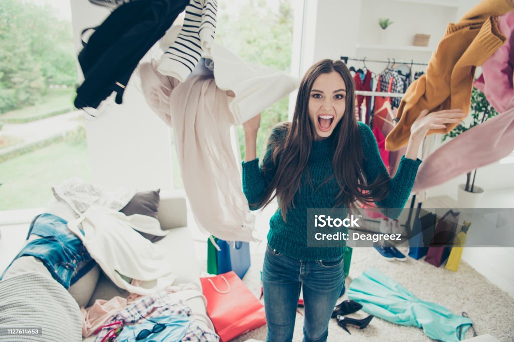 Portrait of nice cute attractive charming pretty cheerful cheery positive girl student throwing many different new things day dream daydream in light white interior room - Royalty-free Desarrumação Foto de stock