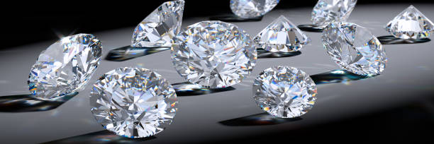 istock Close-up round diamonds with shadows, caustics, on gray background 1127614796