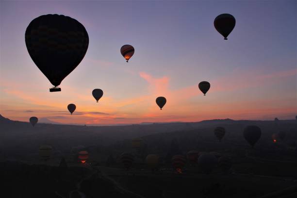 istock Hot air baloons at the sunrise 1127615963