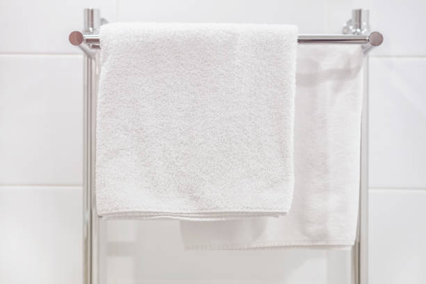 istock Hanging on a hanger in the bathroom white towels 1127617521