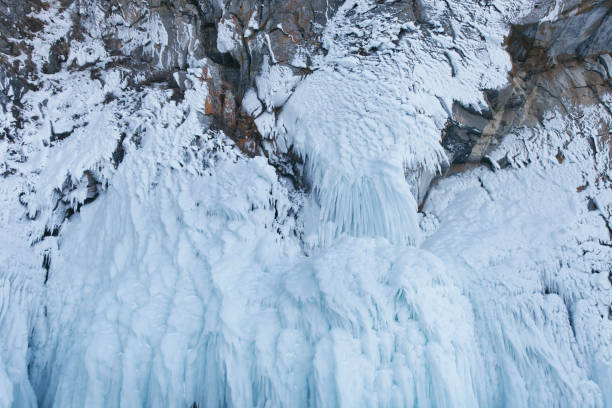 istock Large Icicles. Winter frozen nature 1127620325