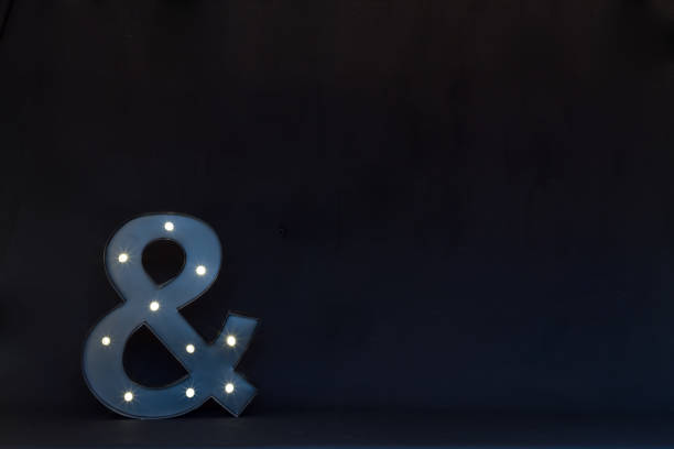 istock Lighted Marquis Ampersand on Black 1127624071
