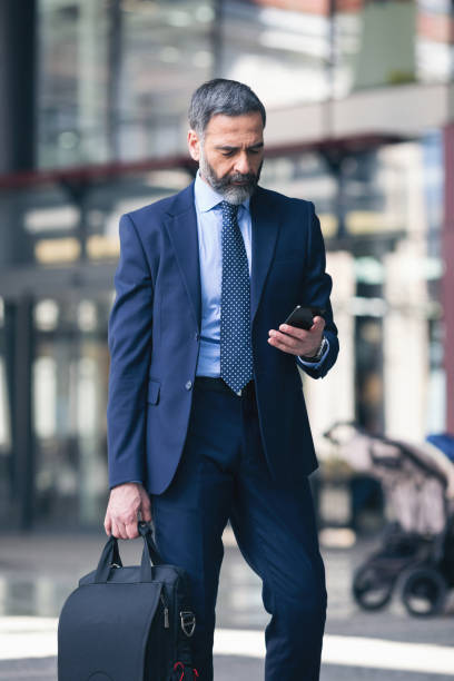 istock Senior businessman on the go 1127624877