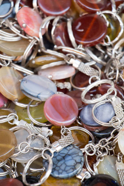istock Key holder ring attached to a semi precious stone 1127625228