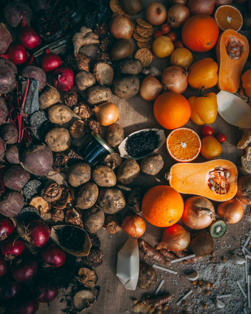 istock oranges, pumpkins and other veg put together in an autumn setting 1127625697
