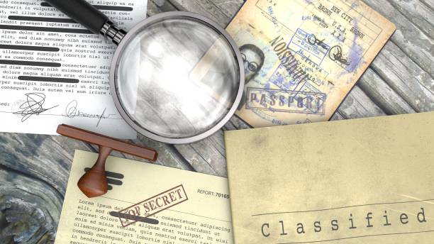 istock Top secret document, declassified, confidential information, secret text. Rubber stamp and magnifying glass. Passport, secret agent 1127626454