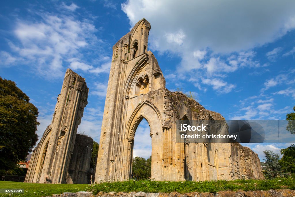 Ruins of Glastonbury Abbey in Somerset A view of the historic ruins of Glastonbury Abbey in Somerset, UK. Glastonbury Abbey Stock Photo