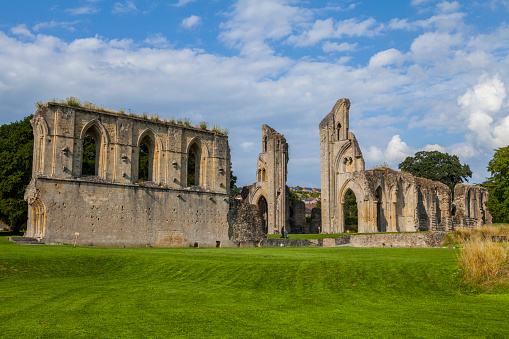 A view of the historic ruins of Glastonbury Abbey in Somerset, UK.