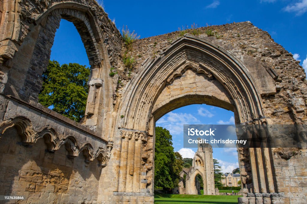 Ruins of Glastonbury Abbey in Somerset A view of the historic ruins of Glastonbury Abbey in Somerset, UK. Glastonbury Abbey Stock Photo