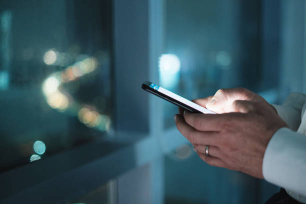 istock Hands Of Business Man Typing Text Message On Phone 1127638101