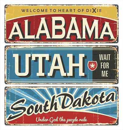 Vintage tin sign collection with USA cities.