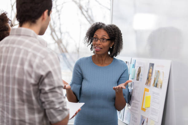 Businesswoman presents ideas to clients