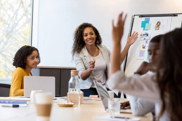 istock Design professionals brainstorm during meeting 1127642974