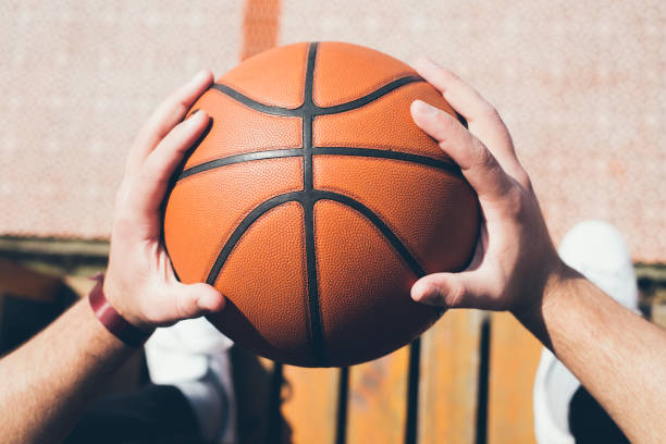 istock Man holds the ball for basketball 1127643173