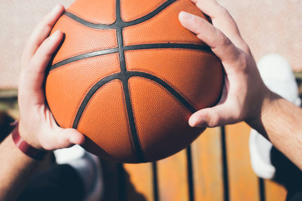 istock Man holds the ball for basketball 1127643207
