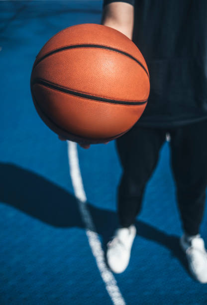 istock Man holds the ball for basketball 1127643538