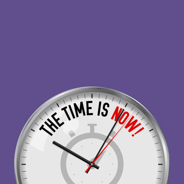 istock The Time is Now. White Vector Clock with Motivational Slogan. Analog Metal Watch with Glass. Stopwatch Icon 1127645726