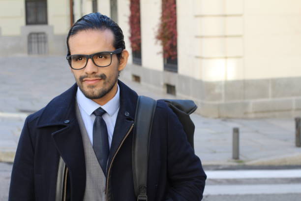 Smiling mature man walking in the park of Mexico city