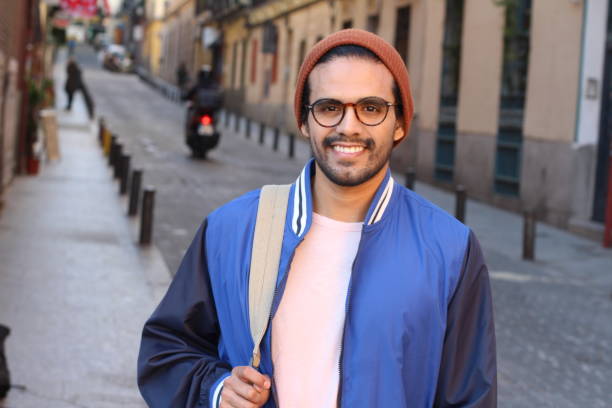 istock Hip ethnic man smiling outdoors 1127645815