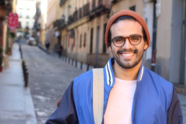 istock Hip ethnic man smiling outdoors 1127645820