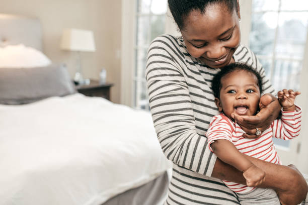 istock mom and newborn baby 1127651239