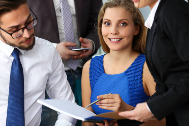 istock Group of modern businesspeople in office 1127652144