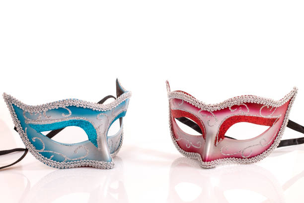 istock blue and red venetian masks 1127656115