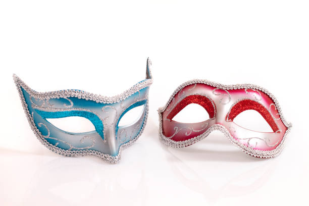 istock blue and red venetian masks 1127656121