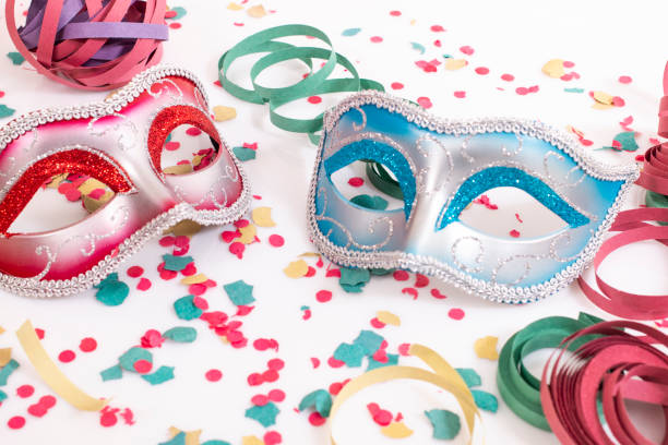 istock venetian masks with confetti 1127656284