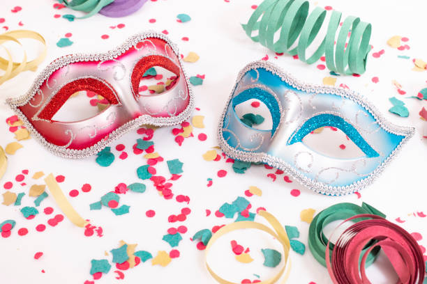 istock venetian masks with confetti 1127656933
